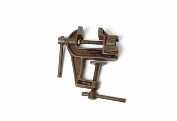 Mechanical hand vise clamp, isolated on white background. Manual instrument, space for text
