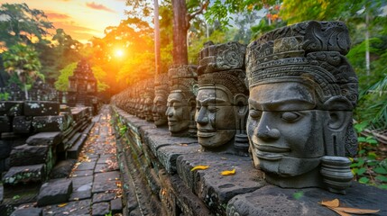  A line of stone heads align on a stone wall Trees flank them The setting sun resides mid-sky above