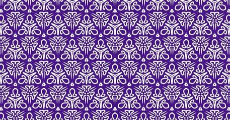 The image displays a repeating geometric pattern featuring stylized, abstract floral designs in white against a deep purple background. Each floral motif is symmetrical, with intricate,