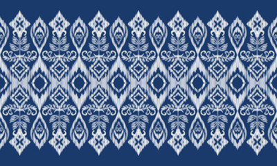 Hand draw Ikat floral paisley embroidery.geometric ethnic oriental seamless pattern traditional.Aztec style abstract vector illustration.blue background.great for textiles, banners, wallpapers.