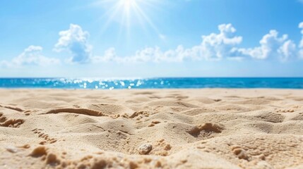 Tranquil beach with sparkling ocean under bright summer sun