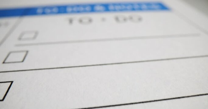 Closeup video of to do list in personal organizer