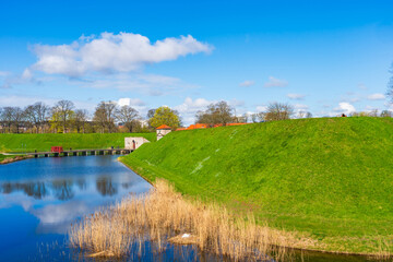 View of moat and entrance to Kastellet citatel in Copenhagen, Denmark
