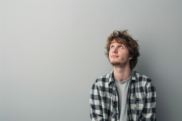 Fototapeta premium Young adult in a minimal background