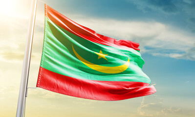 Mauritania national flag waving in beautiful sky.