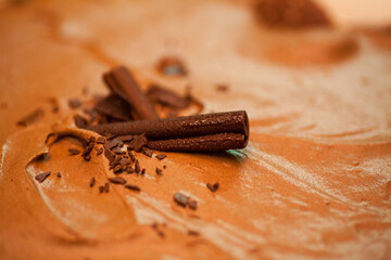 Closeup photo of a delicious chocolate dessert with dark chocolate shavings, perfect for any dessert lover