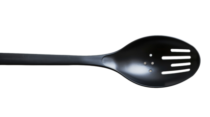 A black spatula with holes for draining oil and liquid from food items in a kitchen setting