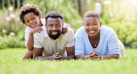 Portrait, black family and parents with kid, grass in backyard and outdoor weekend fun together....
