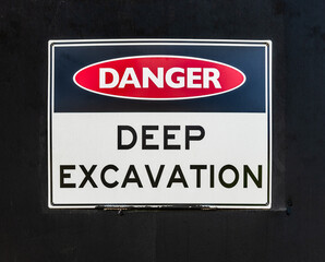 Fototapeta premium A DANGER sign informing of a Deep Excavation in the area