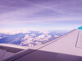 Fototapeta na wymiar View to the sky and clouds from airplane