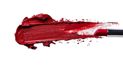 A red lipstick smudge on a surface with a brush sticking out of it