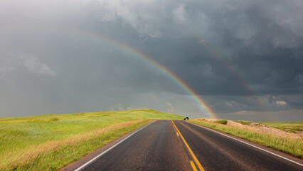 Double rainbow over the prairie in Badlands National Park after a summer storm, South Dakota	