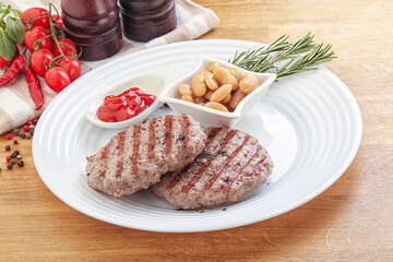 Grilled beef burger cutlet with sauce