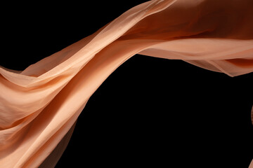 Orange Organza fabric flying in curve shape, Piece of textile Orange Organza fabric throw fall in...