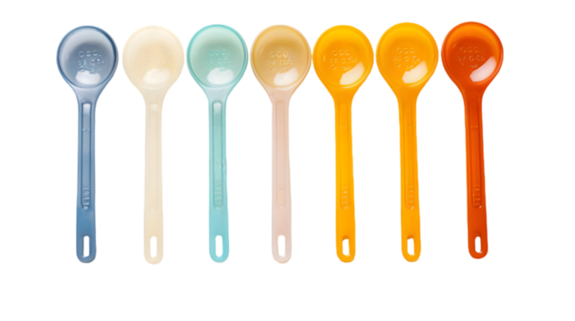 A set of plastic measuring spoons isolated on transparent background.