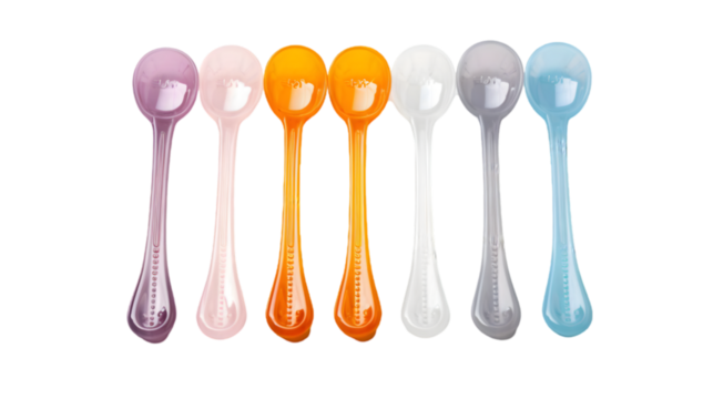 A set of plastic measuring spoons isolated on transparent background.