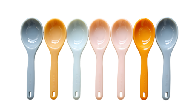 A set of plastic measuring spoons isolated on transparent background.