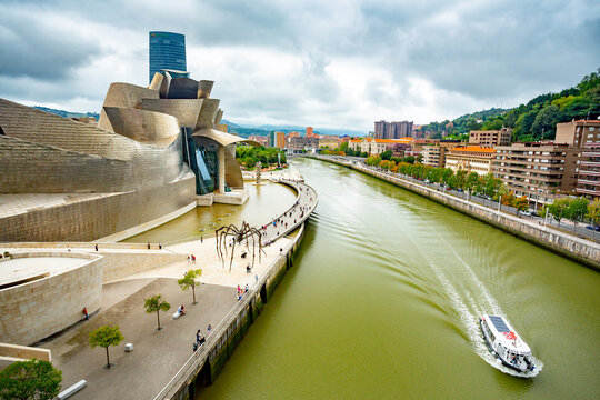 Bilbao, Spain - August 31 2022: Guggenheim museum and La salve bridge view