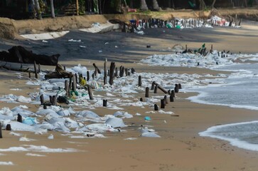 garbage on the baech pollution the shore of a tropical beach highlights the worldwide plastic pollution crisis even