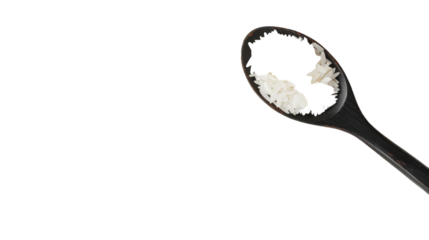 A toothbrush filled with toothpaste is placed on a clean white background