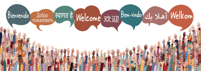 Hand raised of multicultural people from different nations and continents with speech bubbles with text -Welcome- in various international languages.Communication.Community. Diversity © melita