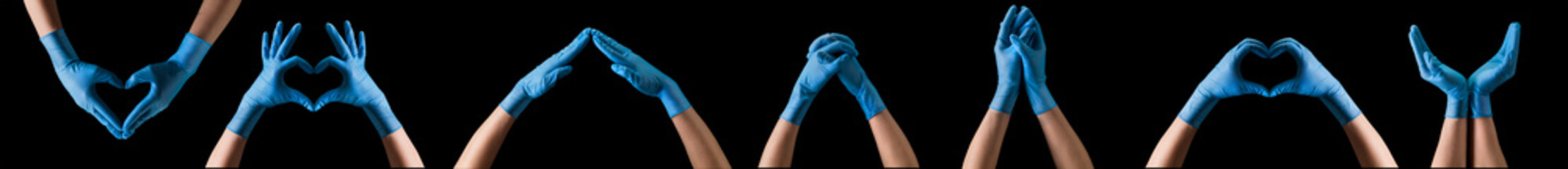 Doctor's hand in sterile medical gloves showing gesture or something on black