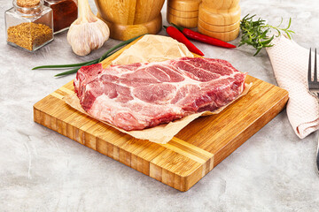 Raw pork neck steak for grill