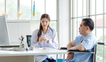 Obraz premium Asian woman doctor professional preparing for shot injection of medicinal drug in arm of elderly man patient in hospital or clinic. Healthcare and medical service vaccine injection concept.