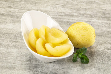 Canned yellow pear with syrup