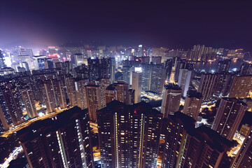 City Skyline at Night: Aerial View of Illuminated Skyscrapers
