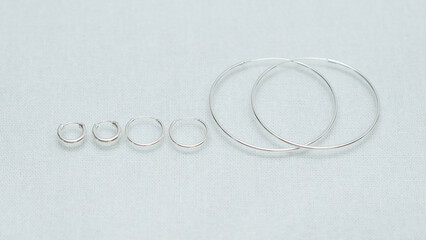 Silver jewelry, Handmade silver accessories display on white background