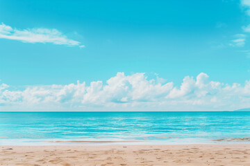 Obraz premium Sunlit Beach with Blue Sky and Ocean View