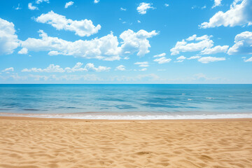 Fototapeta premium Sunlit Beach with Blue Sky and Ocean View