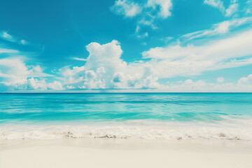 Obraz premium Sunlit Beach with Blue Sky and Ocean View