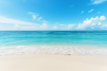 Obraz premium Sunlit Beach with Blue Sky and Ocean View