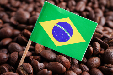 Brazil flag on coffee beans, shopping online for export or import food product.