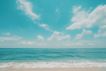 Obraz premium Sunny Beach with Blue Sky and Ocean View