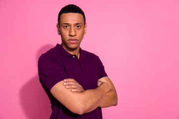 Photo portrait of attractive young man confident crossed hands serious dressed stylish violet...