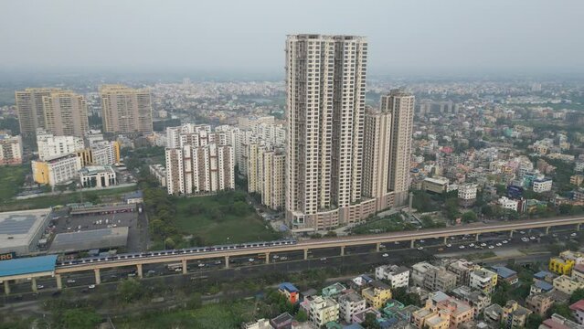Aerial view of the city of Kolkata, West Bengal, India. The highrise buildings and the metro rail view.
