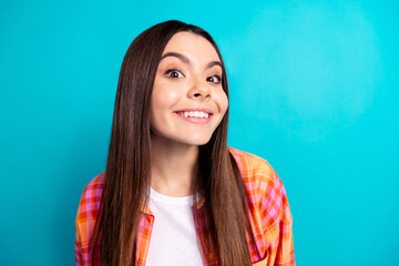 Photo of nice young girl toothy smile listen wear plaid shirt isolated on teal color background