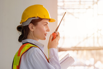 Closeup Smart Working women, Industry Worker, Female Construction Worker Using Radio at...