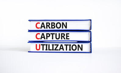 CCU Carbon capture utilization symbol. Concept words CCU Carbon capture utilization on books. Beautiful white background. Business ecological Carbon capture utilization concept. Copy space