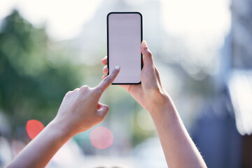 Business person, hands and smartphone with mockup, blank space and product placement outdoor for ad. Marketing, advertising and mobile display for promotion, deal or discount outside on urban street