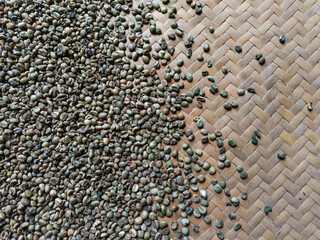 coffee beans in a container made of woven bamboo