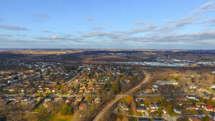 Aerial view of the Grand RIver in January's cold weather, with ice chunks flowing down the Grand River dam in Caledonia, Ontario.