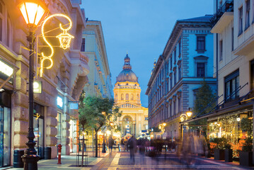 Night street view featuring St. Stephen's Basilica