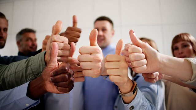 People's Hand Showing Thumb Up Sign