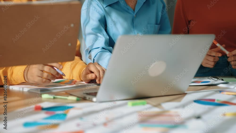 Poster startup company employee working together using laptop analyzing bi dashboard paper on financial dat