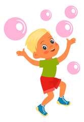 Happy boy jumping with soap bubble flying in air