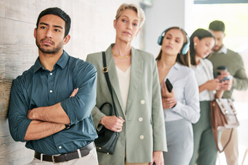 People, man and line for interview in office with queue, business and global opportunity. Group, women and waiting room with technology for career, job and hiring with diversity workplace in London